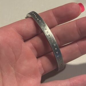 Rene Escobar hinge bracelet with gold clasp and diamonds all around